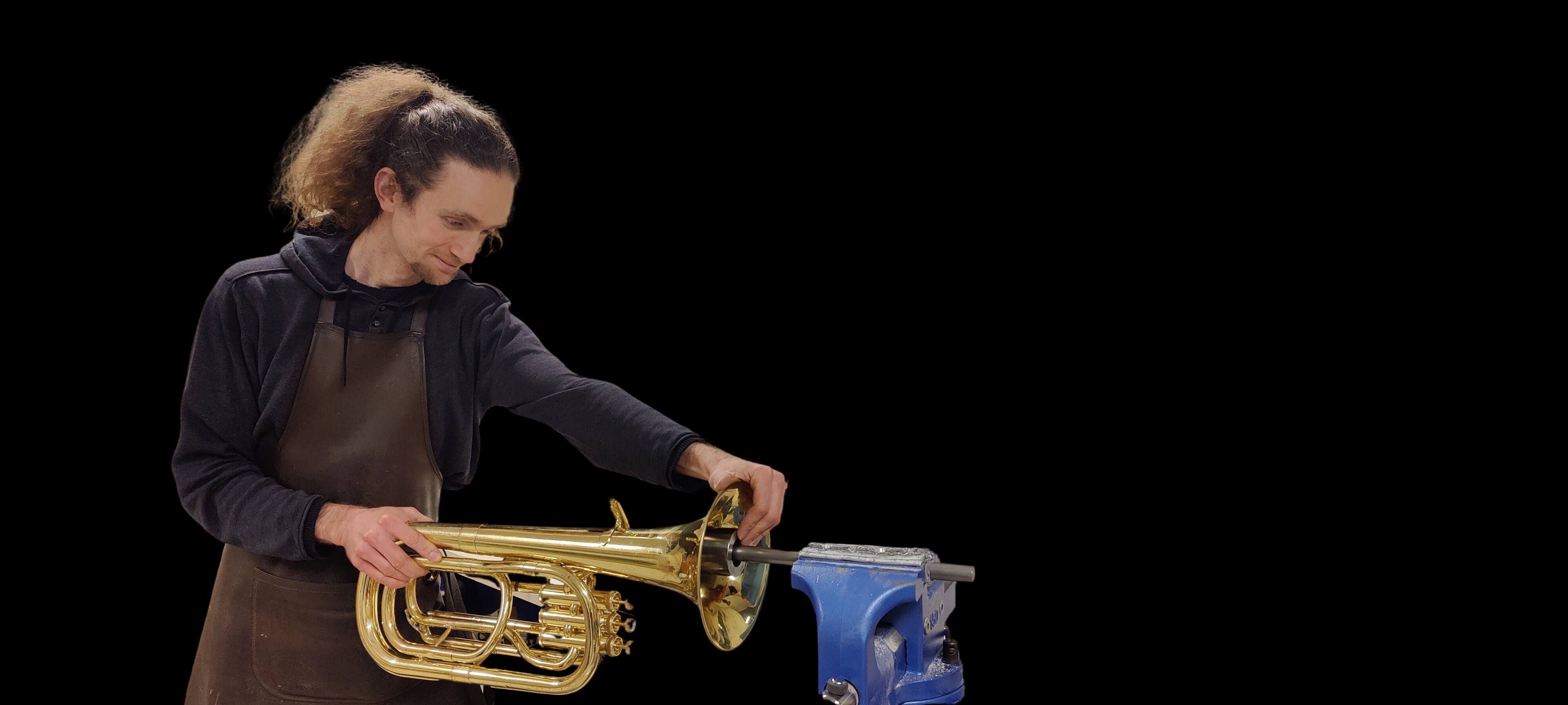 Timothée Reyrolle working on brass instrument